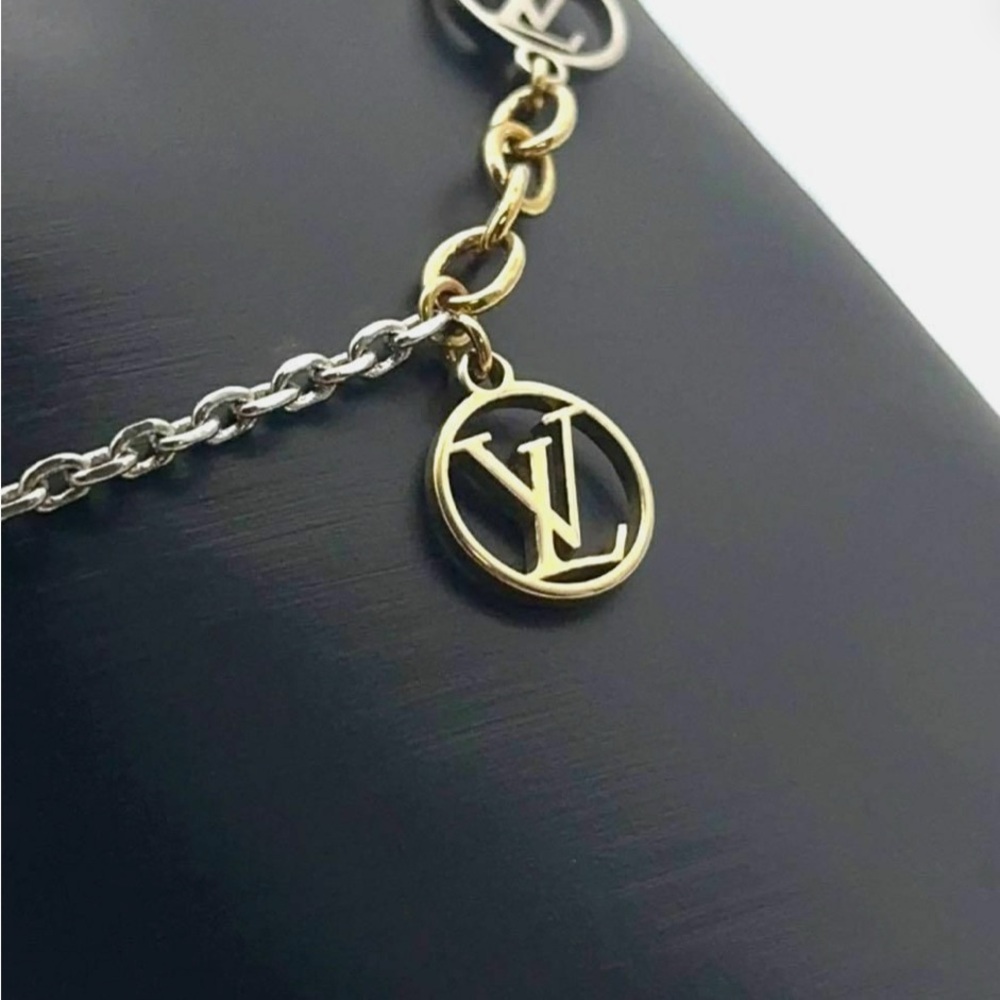 Louis Vuitton Gold and Silver Charm Bracelet